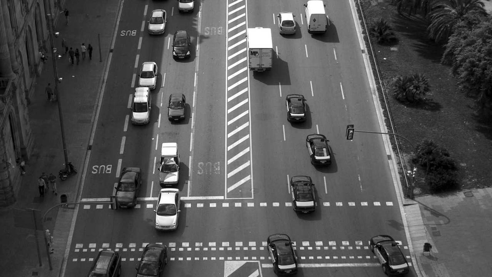 Aerial view of traffic moving through a city intersection